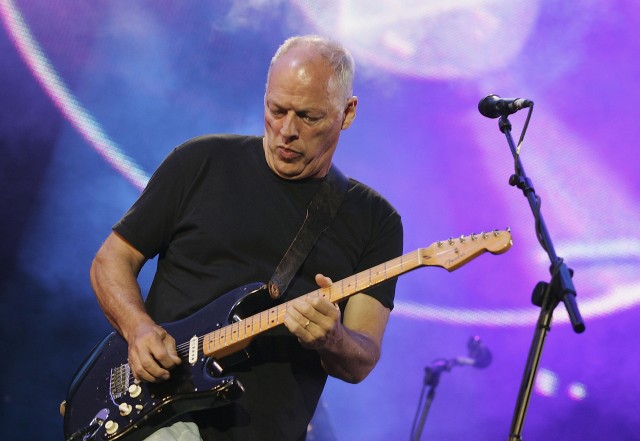 LONDON - JULY 02: Dave Gilmour from the band Pink Floyd on stage at "Live 8 London" in Hyde Park on July 2, 2005 in London, England. The free concert is one of ten simultaneous international gigs including Philadelphia, Berlin, Rome, Paris, Barrie, Tokyo, Cornwall, Moscow and Johannesburg. The concerts precede the G8 summit (July 6-8) to raising awareness for MAKEpovertyHISTORY. (Photo by MJ Kim/Getty Images)