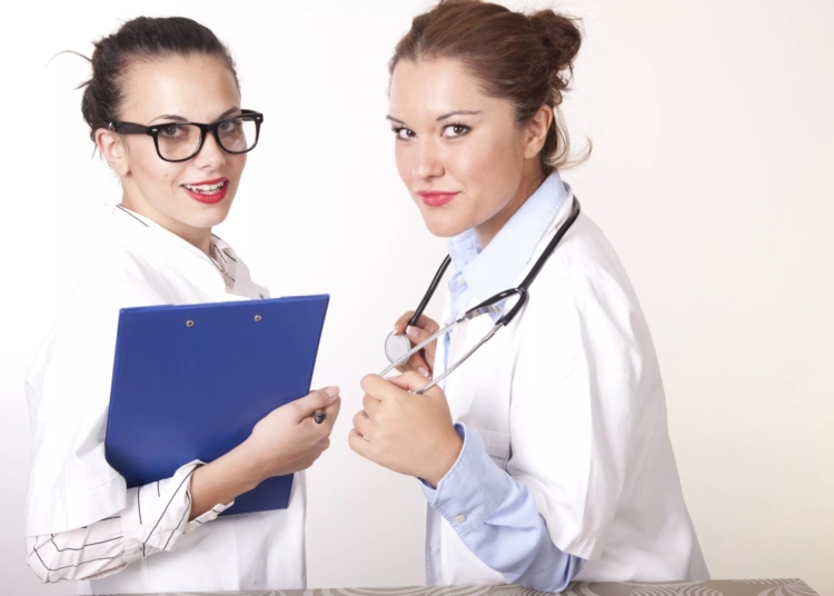 Two young attractive female doctors - Liveuniversity