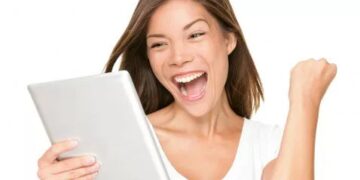 Tablet woman excited