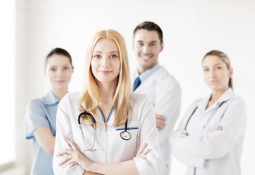 female doctor in front of medical group