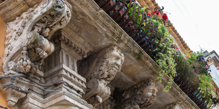 baroque balcony in syracuse sicily italy