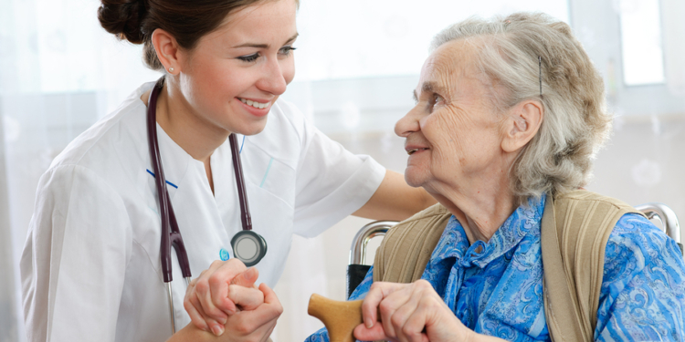 senior woman with her home caregiver