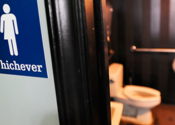 DURHAM, NC - MAY 11:  A gender neutral sign is posted outside a bathrooms at Oval Park Grill on May 11, 2016 in Durham, North Carolina. Debate over transgender bathroom access spreads nationwide as the U.S. Department of Justice countersues North Carolina Governor Pat McCrory from enforcing the provisions of House Bill 2 (HB2) that dictate what bathrooms transgender individuals can use.  (Photo by Sara D. Davis/Getty Images)