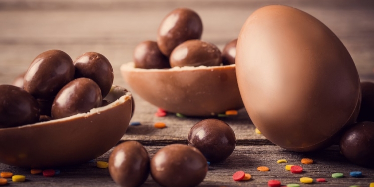 chocolate easter eggs over wooden background