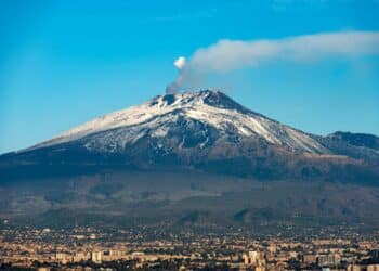 The mount Etna Volcano with smoke and Silvestri craters in the Catania city, Sicily island, Italy (Sicilia, Italia) Europe