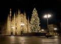 milan italy in winter christmas tree in front of milan cathedral duomo square in december night view starry sky